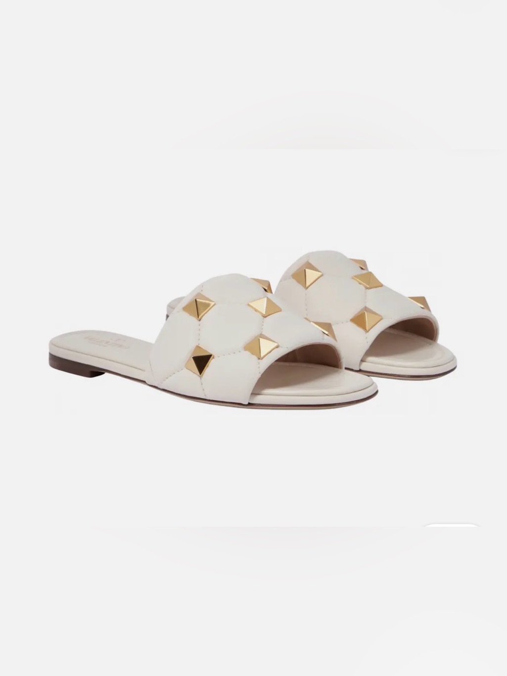 Valentino Garavani Ivory Slide Sandals With Gold Pyramid Studs
